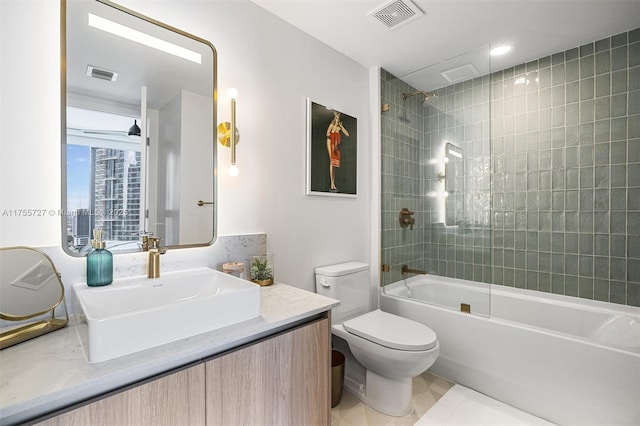 bathroom with shower / bath combination, visible vents, toilet, and vanity