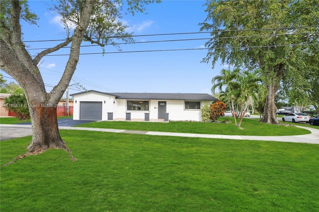 5280 SW 90th Ave, Cooper City, FL 33328 - single story home featuring asphalt driveway, an attached garage, stucco siding, and a front lawn