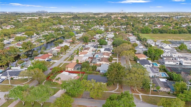 birds eye view of property with a residential view