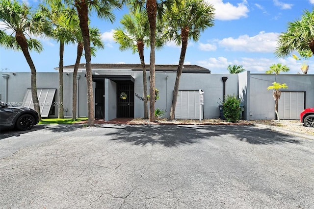 exterior space with a gate