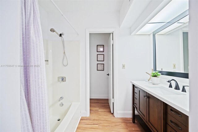 16408 Bridge End Rd, Miami Lakes, FL 33014 - full bath featuring baseboards, shower / bath combination with curtain, wood finished floors, and vanity