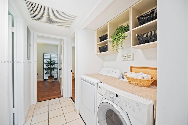 16408 Bridge End Rd, Miami Lakes, FL 33014 - washroom featuring visible vents, baseboards, laundry area, washer and clothes dryer, and light tile patterned floors