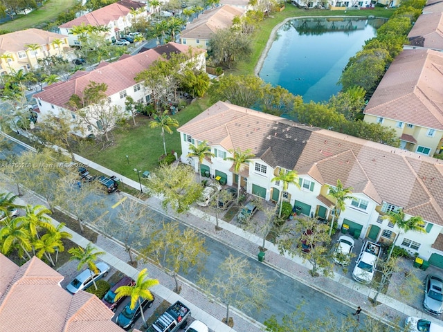 aerial view featuring a residential view and a water view