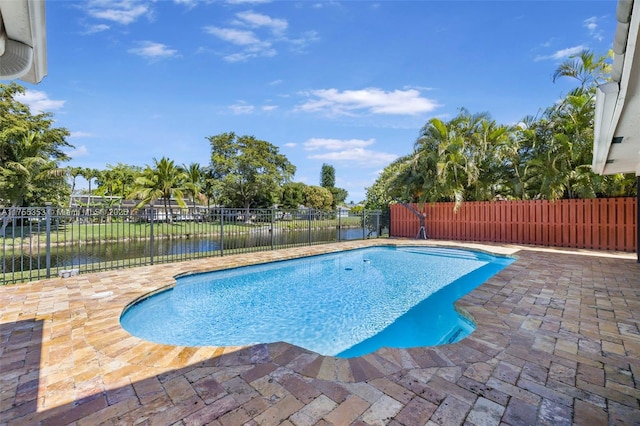 view of pool with a water view, a fenced backyard, a fenced in pool, and a patio