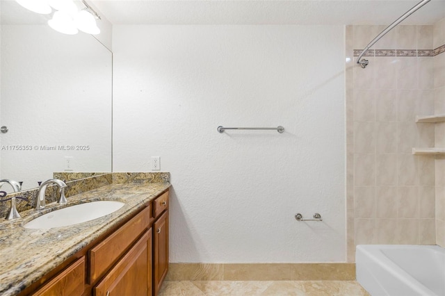 full bathroom featuring bathing tub / shower combination and vanity