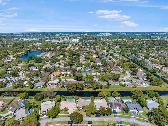 aerial view featuring a residential view and a water view