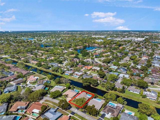 aerial view featuring a water view and a residential view