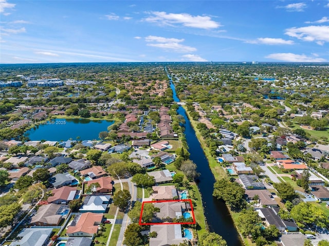 bird's eye view with a water view and a residential view