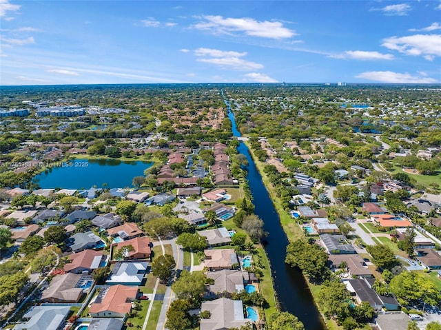 aerial view with a water view and a residential view
