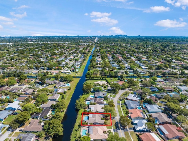 aerial view featuring a water view and a residential view
