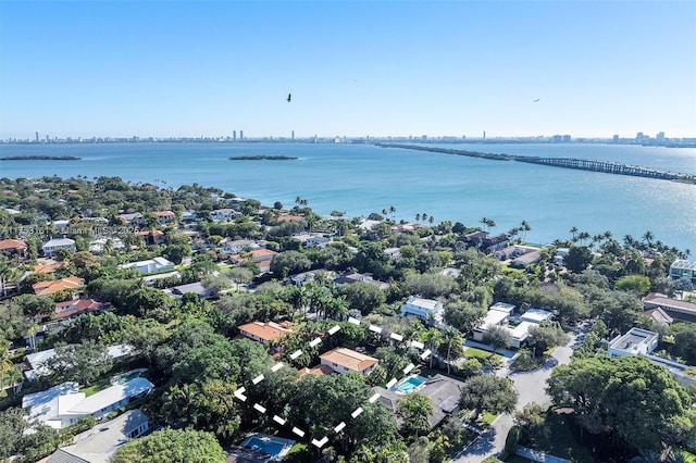 aerial view featuring a water view and a city view