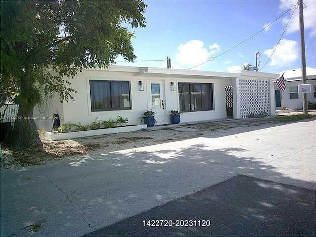 view of front of house with stucco siding