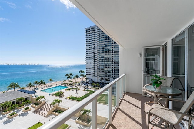 balcony featuring a water view