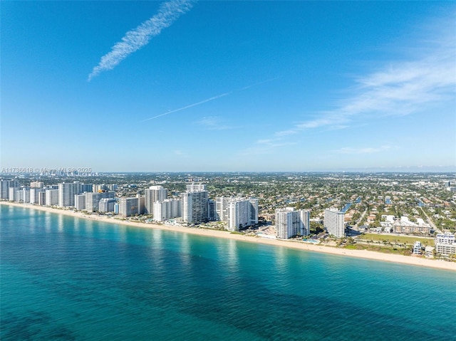 aerial view featuring a water view and a view of city