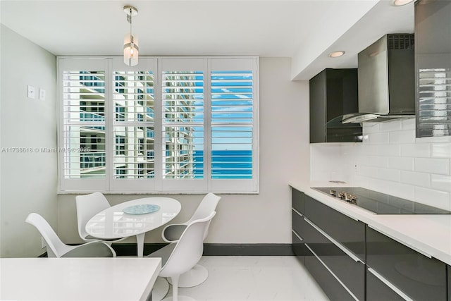 dining room featuring marble finish floor and baseboards