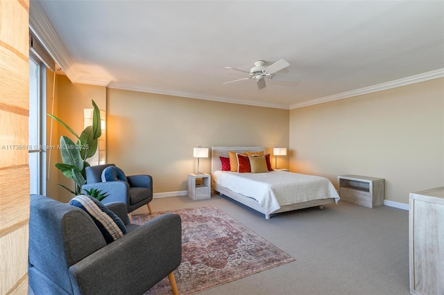 bedroom with ceiling fan, baseboards, ornamental molding, and carpet flooring