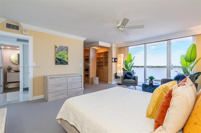 bedroom featuring visible vents, carpet flooring, baseboards, and access to exterior