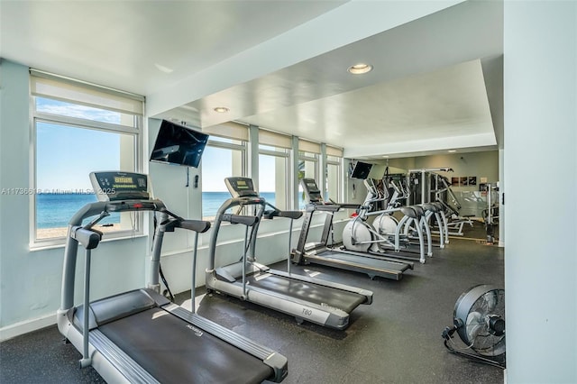 exercise room with baseboards