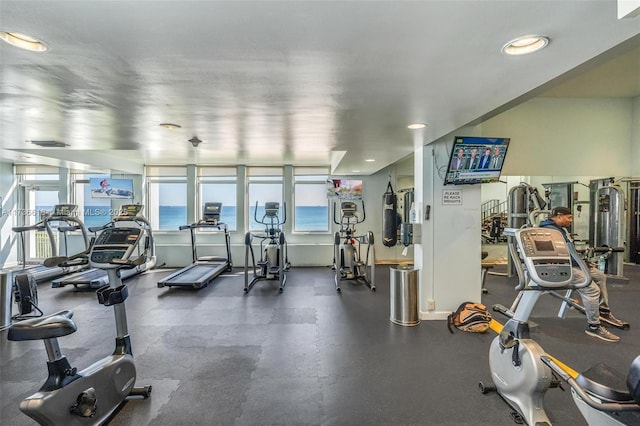 gym featuring recessed lighting