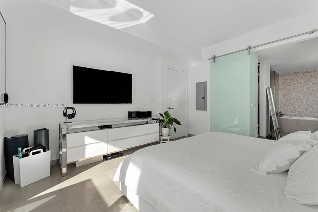 68 SE 6th St Unit 3506, Miami, FL 33131 - bedroom featuring electric panel and a barn door