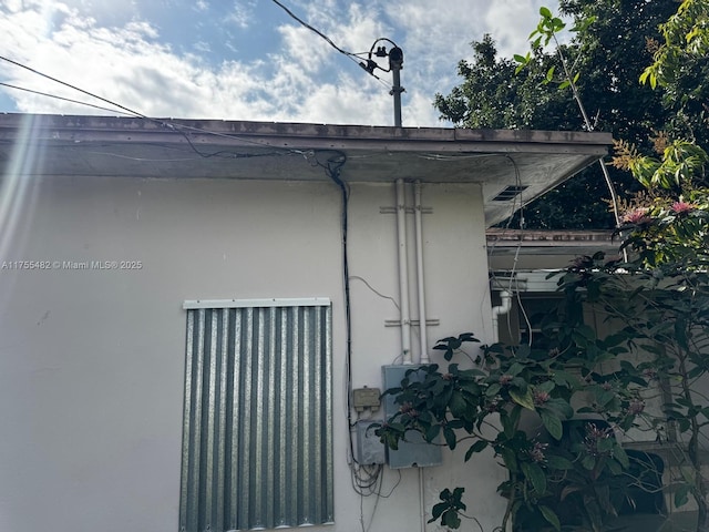 view of property exterior with stucco siding