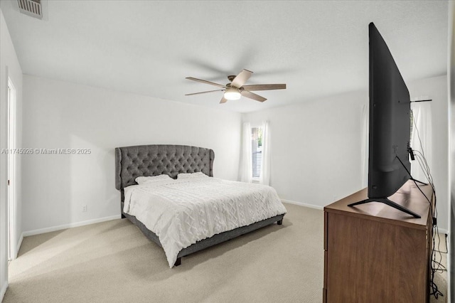 bedroom featuring carpet, visible vents, ceiling fan, and baseboards