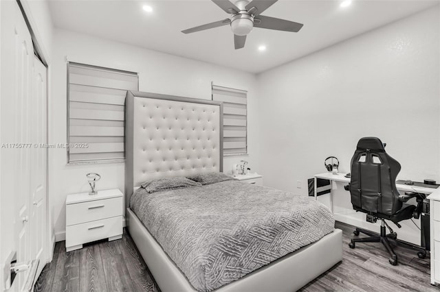 bedroom with baseboards, a ceiling fan, wood finished floors, and recessed lighting