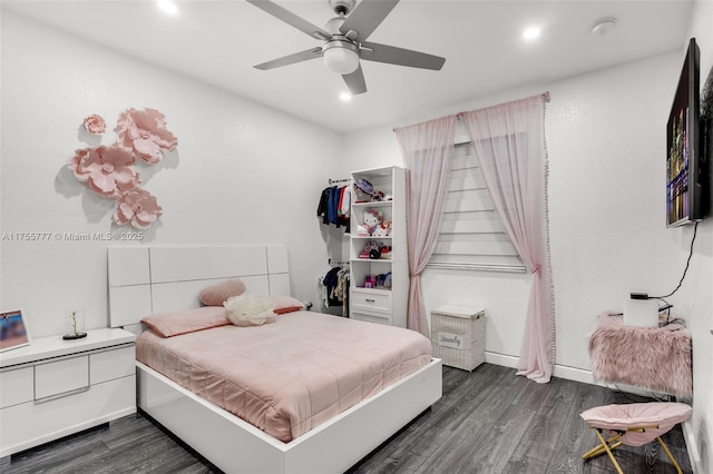 bedroom featuring ceiling fan, baseboards, dark wood-style flooring, and recessed lighting