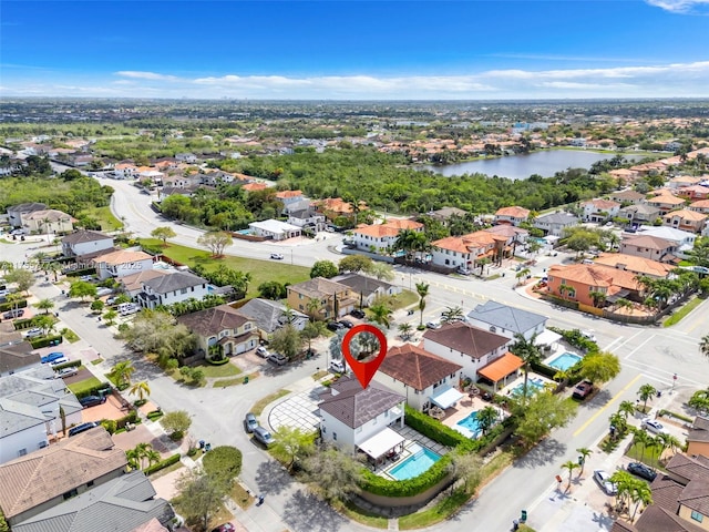 aerial view featuring a water view and a residential view