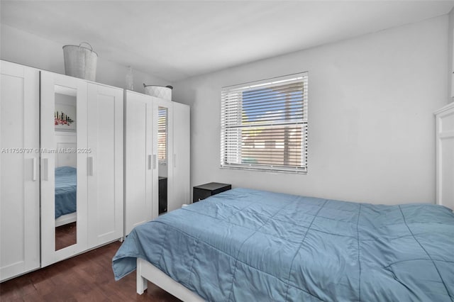 bedroom featuring wood finished floors