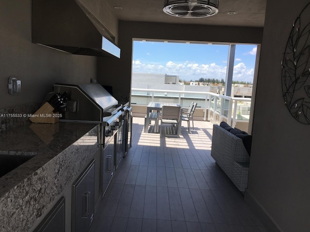 view of patio featuring a balcony, grilling area, and area for grilling