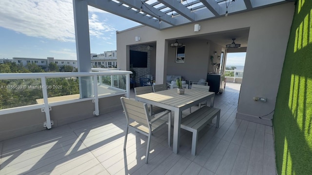 exterior space featuring outdoor dining space and a pergola