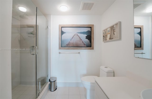 bathroom featuring toilet, a shower stall, visible vents, and tile patterned floors