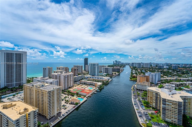 aerial view with a view of city and a water view