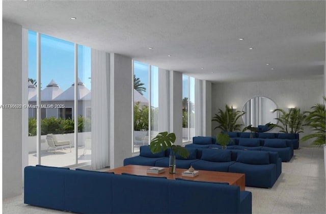 living room with recessed lighting and expansive windows