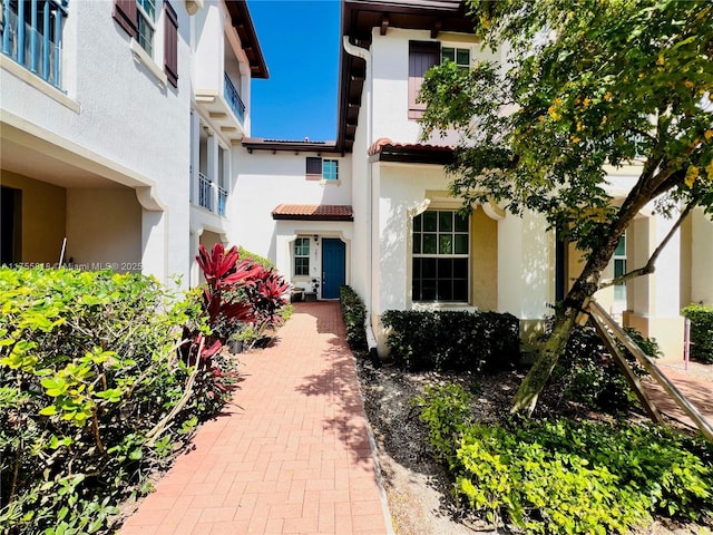 exterior space featuring stucco siding