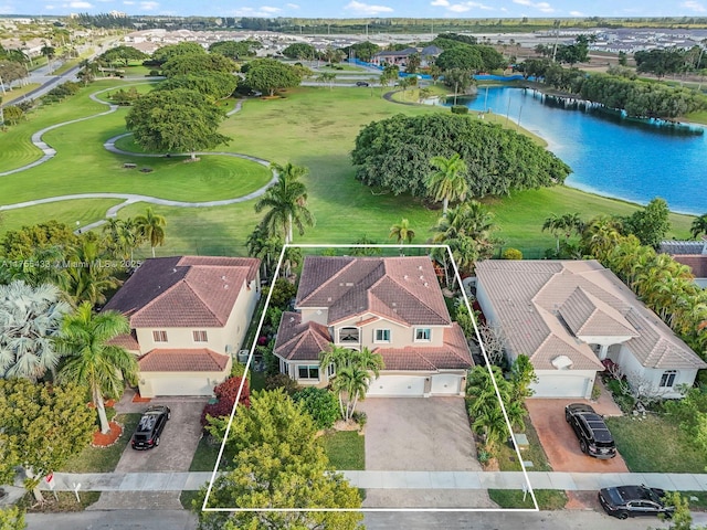 aerial view featuring a water view and a residential view