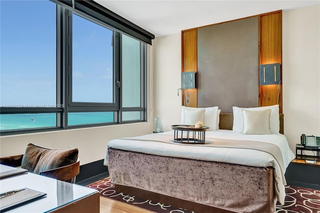 bedroom featuring wood finished floors