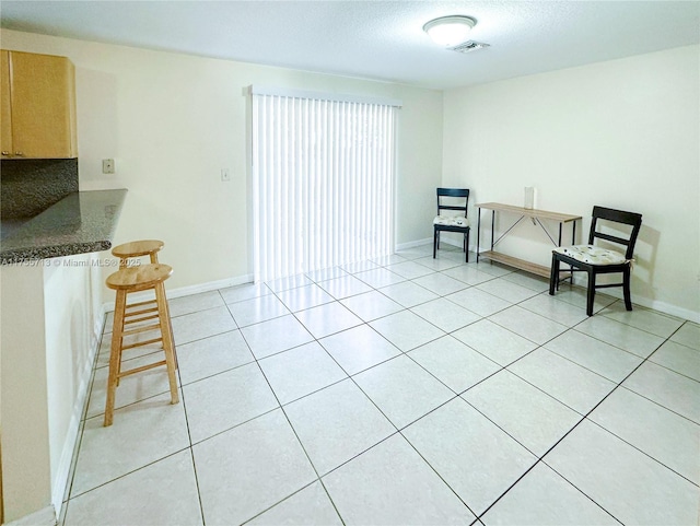 14116 SW 260th St Unit 105, Homestead, FL 33032 - sitting room featuring light tile patterned floors, baseboards, and visible vents