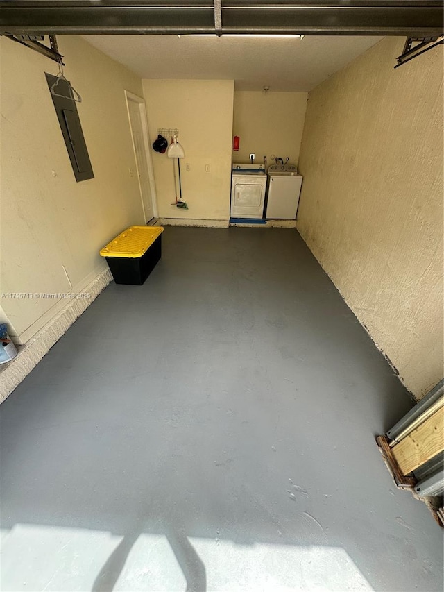 14116 SW 260th St Unit 105, Homestead, FL 33032 - garage featuring washing machine and dryer and electric panel