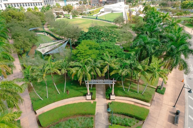 view of home's community with a lawn