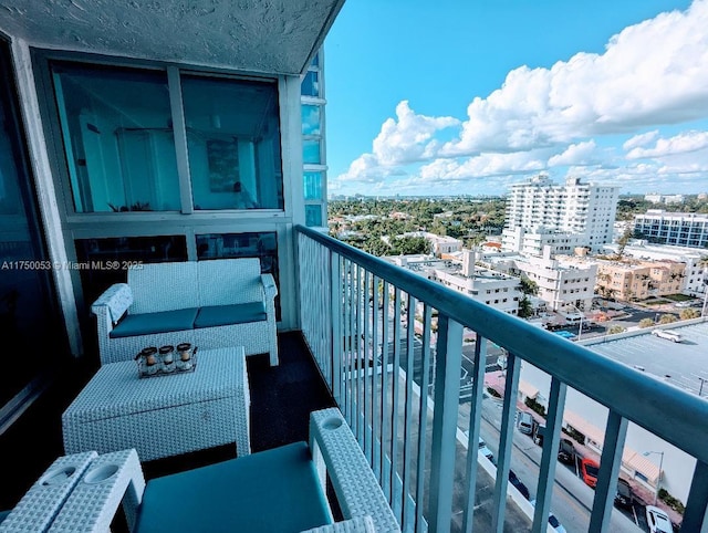 balcony featuring a city view