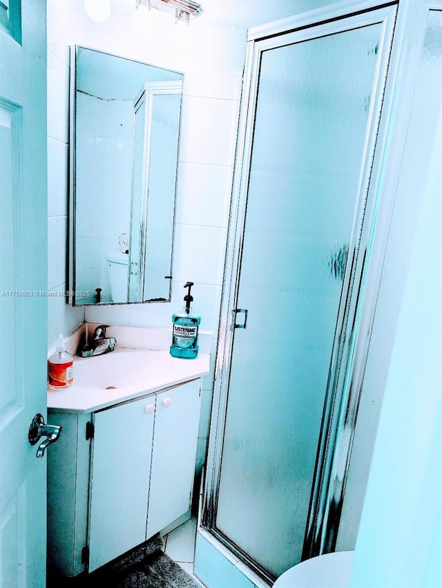 2655 Collins Ave Unit 1505, Miami Beach, FL 33140 - bathroom featuring vanity and a shower stall
