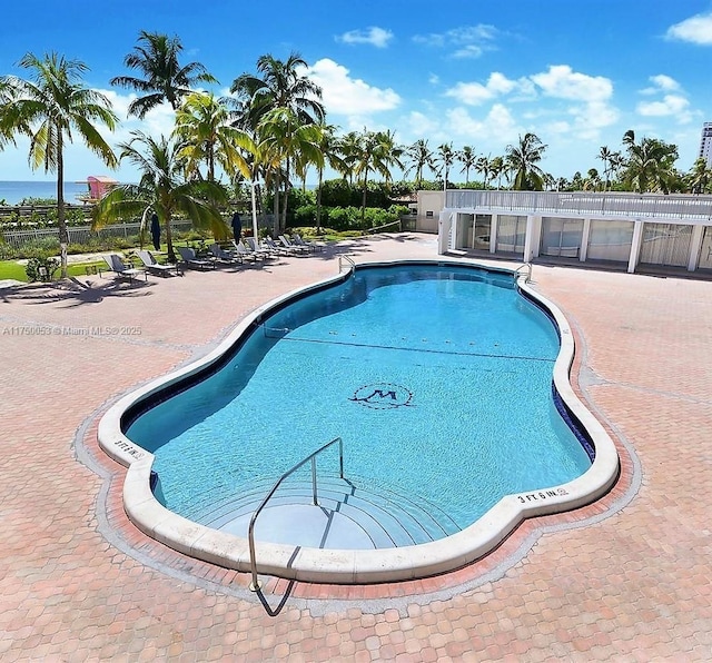 pool featuring a patio area