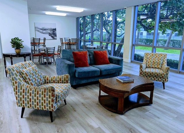 2655 Collins Ave Unit 1505, Miami Beach, FL 33140 - living room with light wood-style flooring and a wall of windows