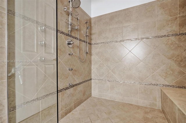 full bathroom with tiled shower