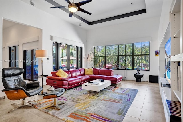 4455 Parkside Rd, Davie, FL 33328 - living area featuring plenty of natural light, tile patterned flooring, a high ceiling, and ceiling fan