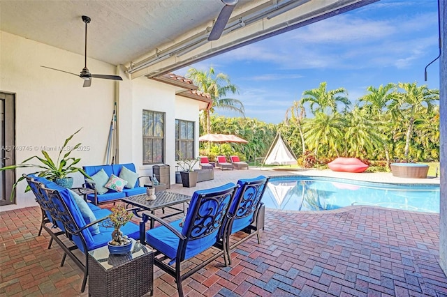 4455 Parkside Rd, Davie, FL 33328 - view of patio / terrace featuring an outdoor living space, an outdoor pool, and ceiling fan