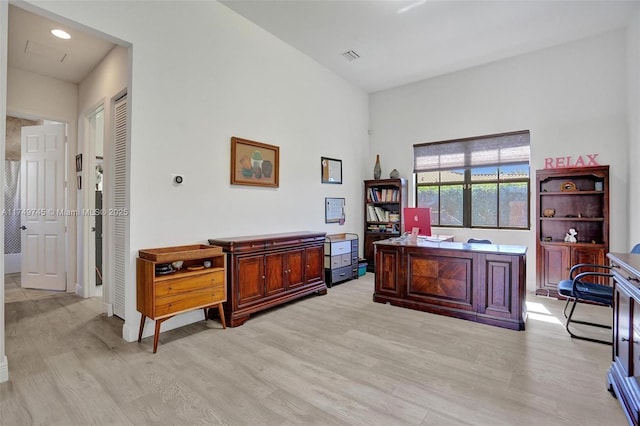 office featuring light wood-type flooring and visible vents