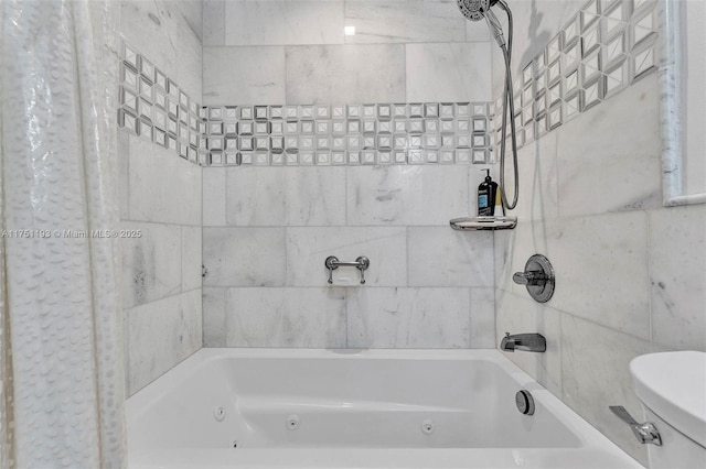 bathroom featuring a combined bath / shower with jetted tub and toilet